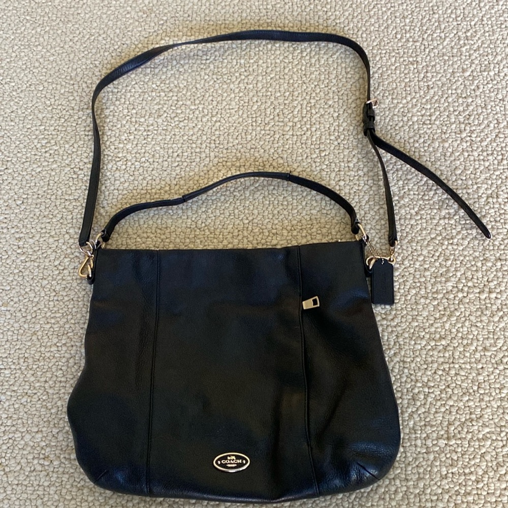 Coach black leather bag with 2 choices of straps.  Removable shoulder strap.